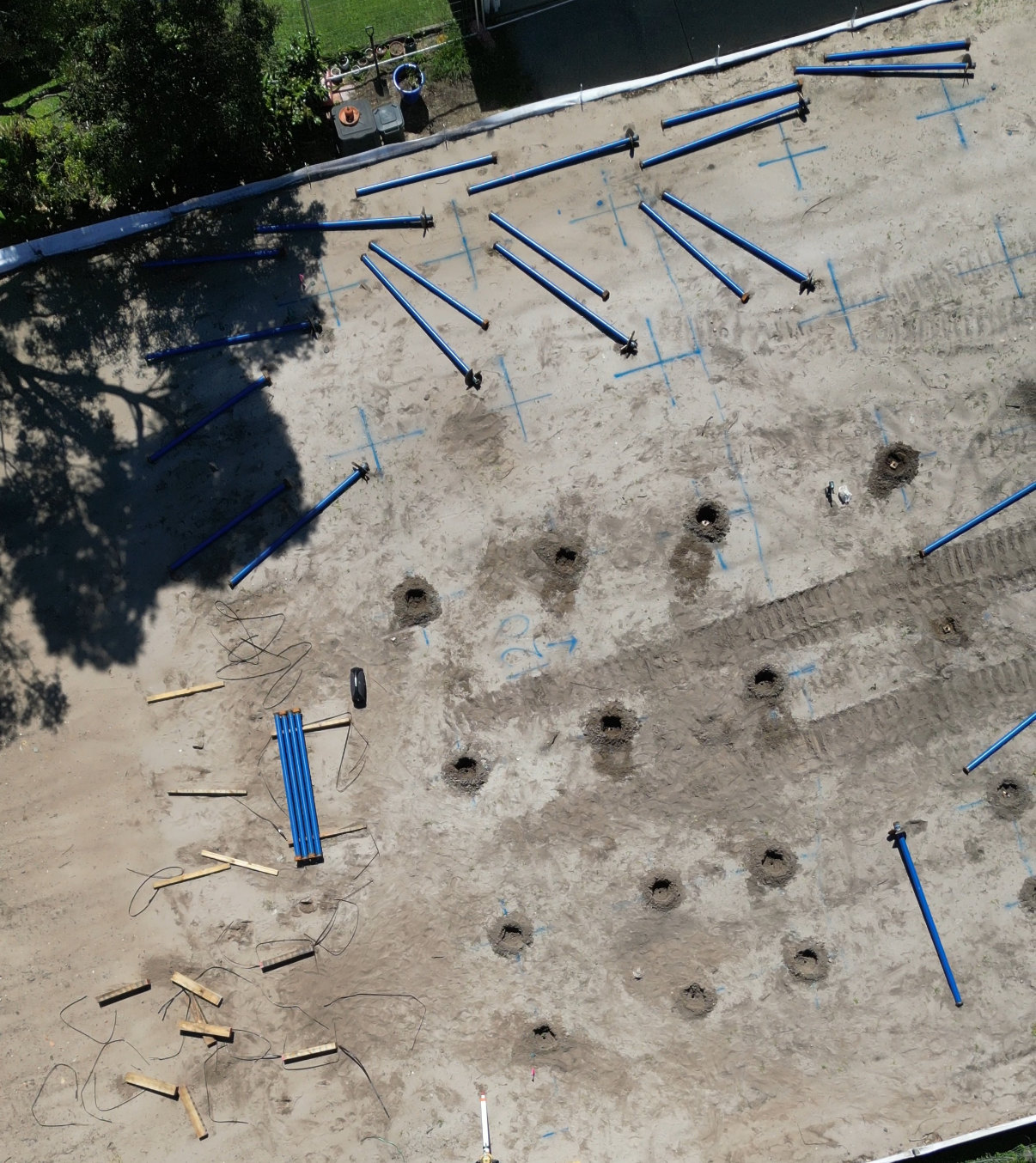 Aerial view of screw pile foundation installation site